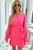 Women wearing a pink Ruffle Hem Mini Dress with flounce sleeves and shiny finish, standing outdoors. Fashionable and elegant look.