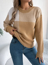 Woman wearing Color Block Striped Sweater with round neck and cozy design
