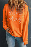 Game Day Sweatshirt with round neck and long sleeves in orange, perfect for casual comfort and sporty style.