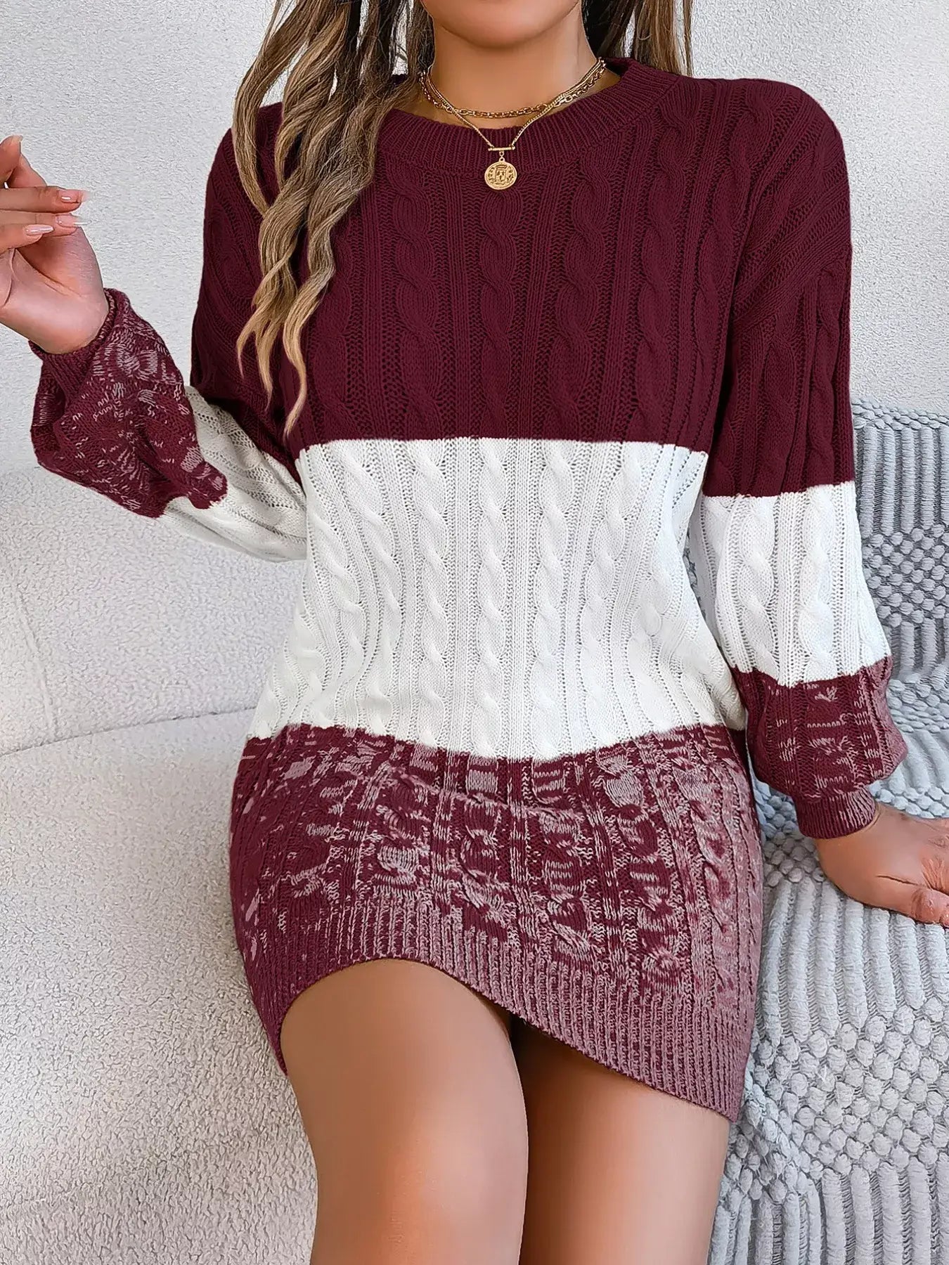 Color block cable knit sweater dress with textured pattern in maroon and white, featuring basic style with slight stretch, 100% acrylic.