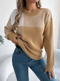 Woman wearing Color Block Striped Sweater with round neck and cozy design