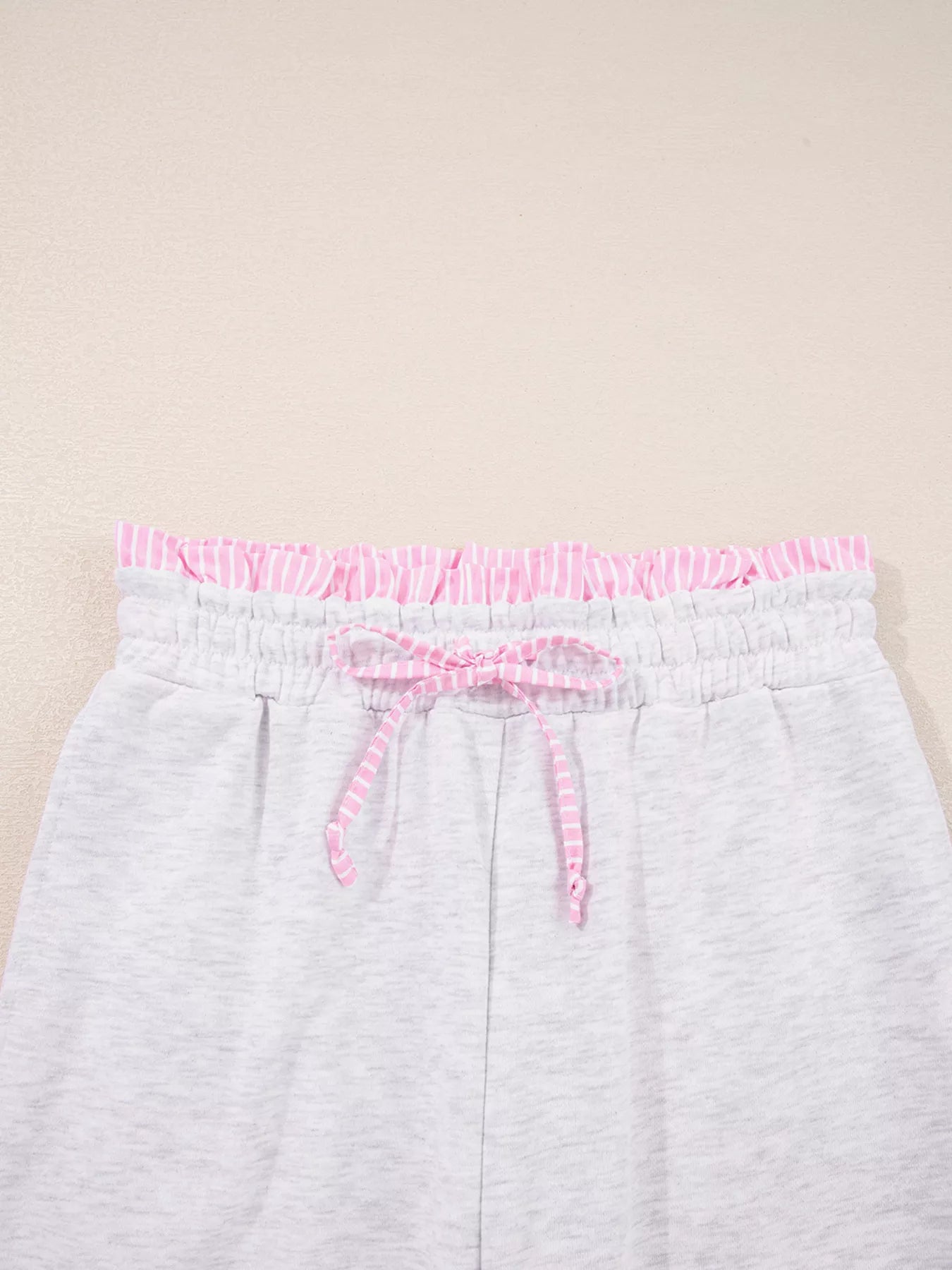 Contrasted Trim Pant Set drawstring detail with pink trim and elastic waistband.