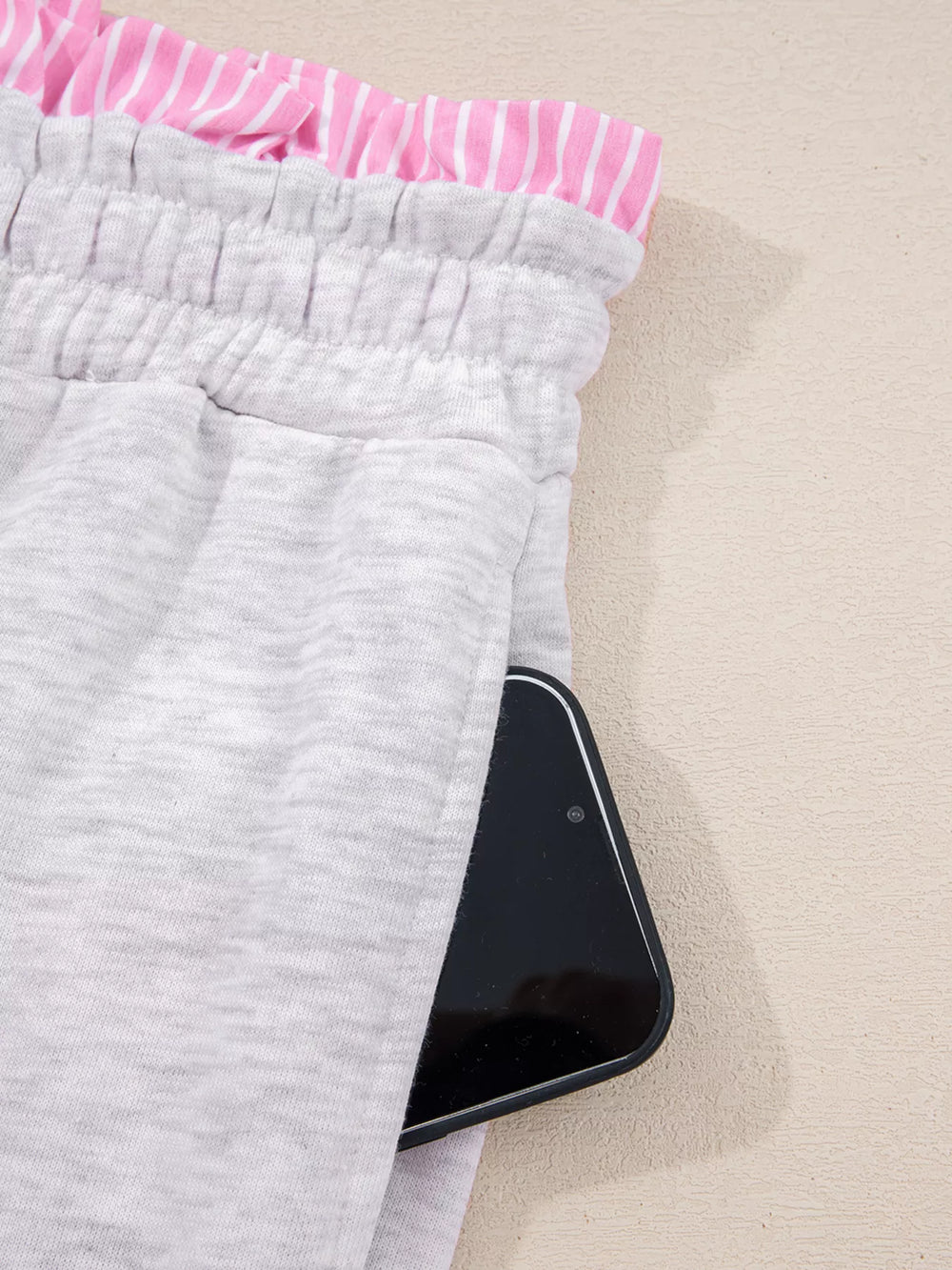 Close-up of Contrasted Trim Pant Set drawstring pants with phone pocket detail