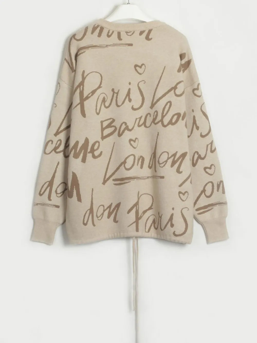 Letter Pattern Sweater with drawstring hem and dropped shoulder, featuring stylish letter design, comfortable beige knit.