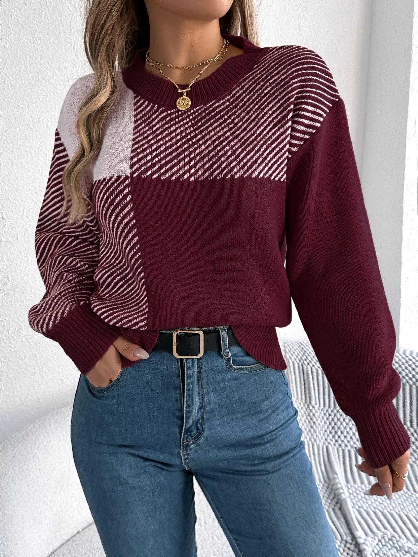 Color Block Striped Sweater with round neck and bold design, perfect for cozy and contemporary style.